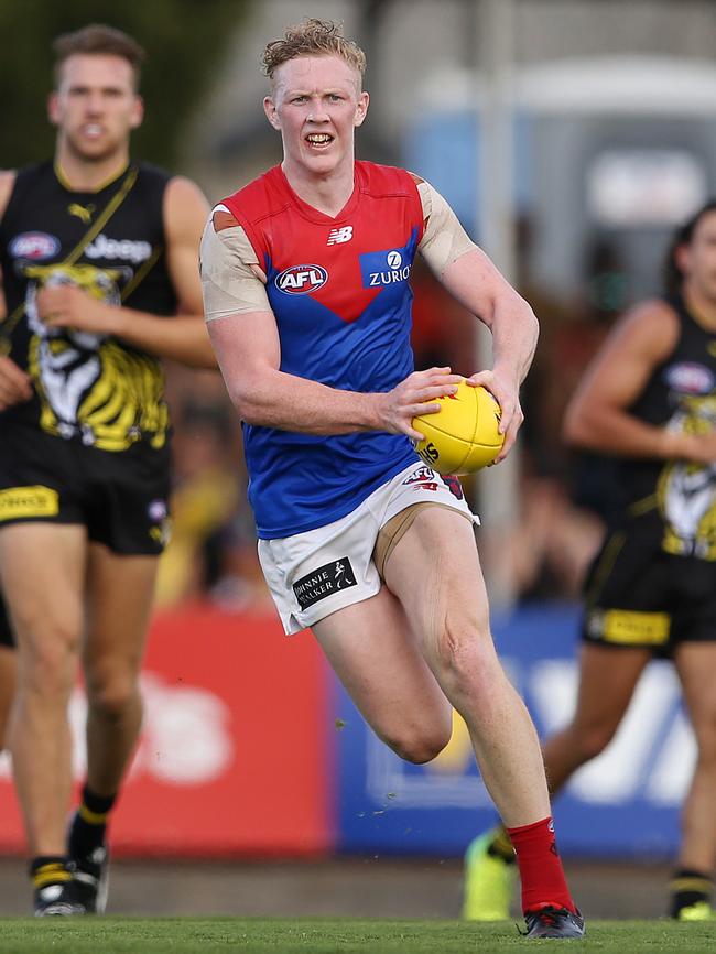 Melbourne's Clayton Oliver runs through the middle against Richmond at Deakin Reserve, Shepparton. Picture: Michael Klein