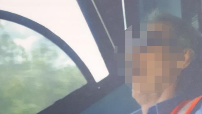 A Queensland Rail train driver allegedly caught sleeping at his post. Faces have been blurred for legal reasons.