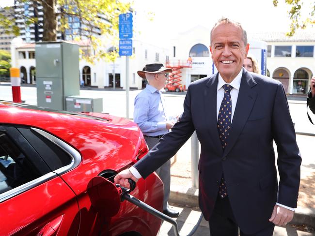 The Leader of the Opposition, Bill Shorten charging an electric car at the launch of Labor's Climate Change Action Plan at ACTEWAGL Electric Car Charging Station in Canberra.. Picture Kym Smith