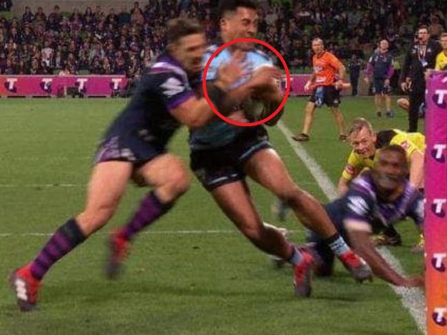 Image shows Billy Slater shoulder charge on Sosaia Feki