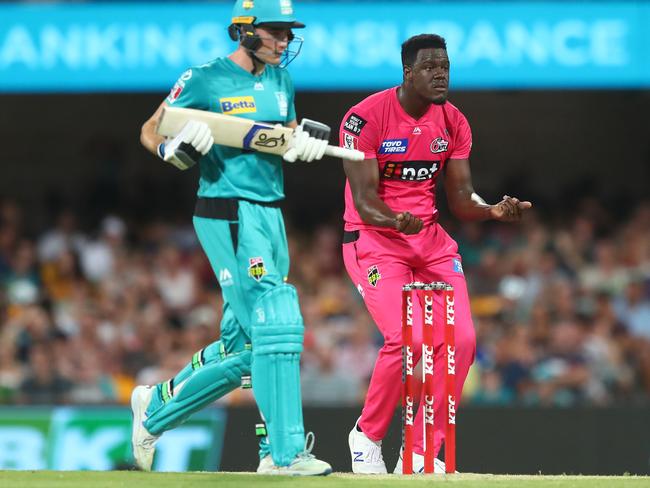 Carlos Brathwaite celebrates after dismissing Sam Heazlett as part of his four-wicket haul.