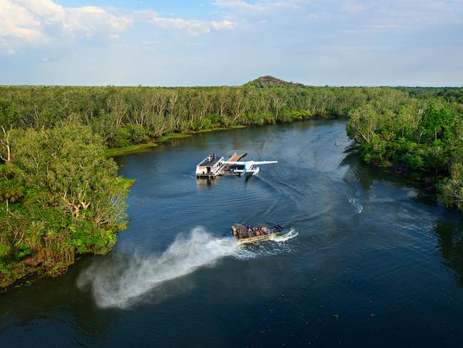 Tour guests are taken on a fast airboat run through the surrounding areas during a ultimate Outback Floatplane Adventure at Sweets Lagoon along the Finniss River.