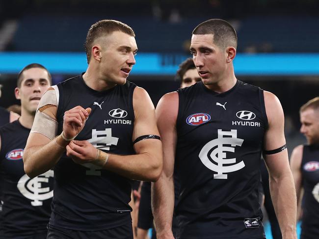 MELBOURNE – June 11: AFL. Patrick Cripps and Jacob Weitering of the Blues after the round 13 AFL match between Carlton and Essendon at the MCG on June 11, 2023, in Melbourne, Australia. Photo by Michael Klein.