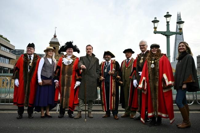 Hollywood’s Damian Lewis herds sheep across bridge in London