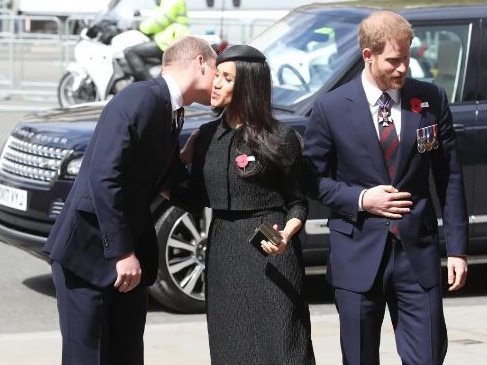 Meghan Markle kisses Prince William. Picture: Supplied