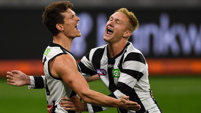 Brody Mihocek celebrates a last-quarter goal with Jaidyn Stephenson. Picture: Getty Images