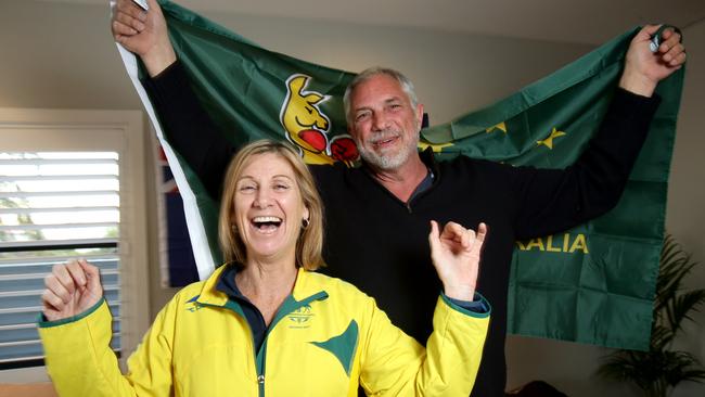 Angela and Darren Harris, parents of Meg Harris, celebrate their daughter’s gold medal at the Tokyo Olympics. Picture: Steve Pohlner