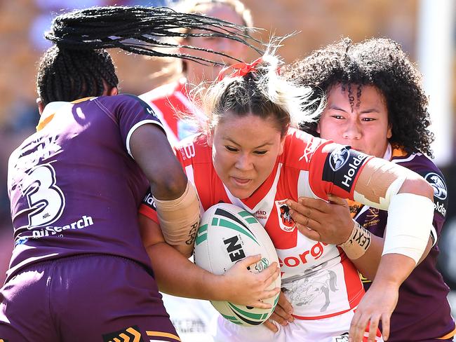 Keeley Davis of the Dragons is tackled  during the NRL Women's Premiership match between the Brisbane Broncos and the St George-Illawarra Dragons at Suncorp Stadium in Brisbane, Sunday, September 9, 2018. (AAP Image/Dave Hunt) NO ARCHIVING, EDITORIAL USE ONLY