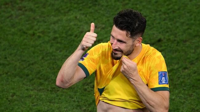 Mathew Leckie celebrates after Australia’s win over Denmark. Picture: AFP