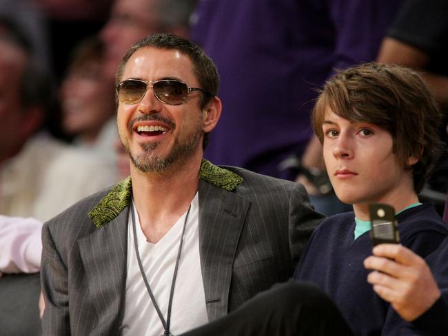 Fatherhood ... Robert Downey Jr. (L) and his son Indio Downey (R) attend a Los Angeles Lakers game.