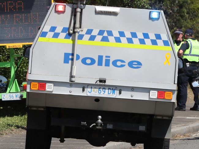 Tasmania Police in attendance at the scene in New Town where initial inquiries indicate a motorcyclist participating in the MRA South Toy Run has left the roadway and collided with a group of spectators. Picture: Nikki Davis-Jones