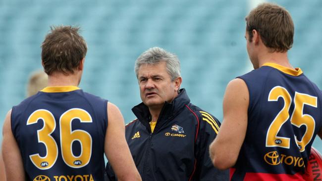 Neil Craig talks to current Melbourne coach Simon Goodwin (left) and incoming Bombers coach (right) Ben Rutten.