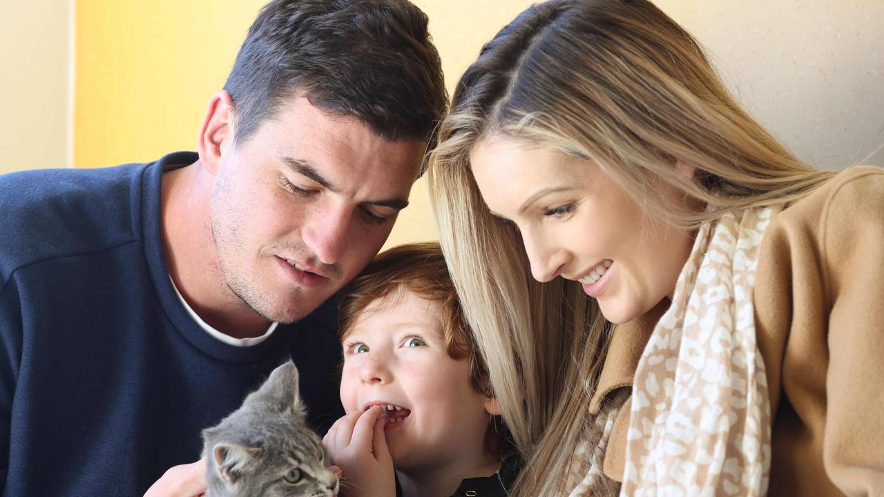 Port Adelaide midfielder Tom Rockliff with wife Sharna and their three-year-old son Jack. Picture: Russell Millard