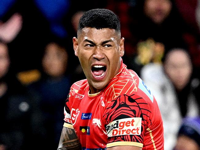 BRISBANE, AUSTRALIA - MAY 20: Jamayne Isaako of the Dolphins celebrates after scoring a try during the round 12 NRL match between Dolphins and Melbourne Storm at Suncorp Stadium on May 20, 2023 in Brisbane, Australia. (Photo by Bradley Kanaris/Getty Images)