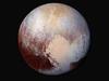 KIDS NEWS: Four images from New Horizons' Long Range Reconnaissance Imager (LORRI) were combined with color data from the spacecraft's Ralph instrument to create this enhanced color global view of Pluto. Picture: NASA.