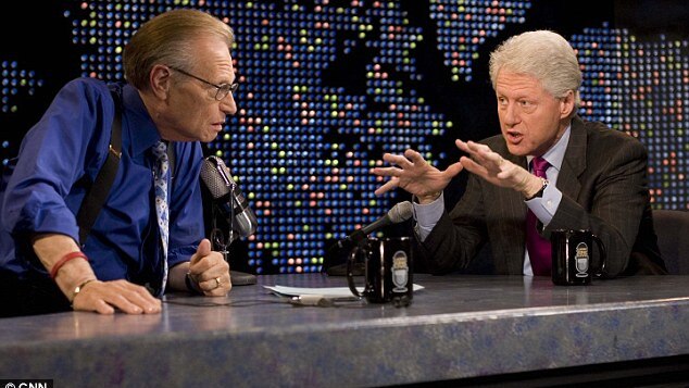 Larry King gets up close and personal with Bill Clinton. Picture: Supplied