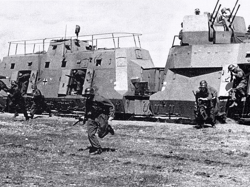 German troops jump from a heavily armoured train, similar to one supposedly buried among mountains in southern Poland.