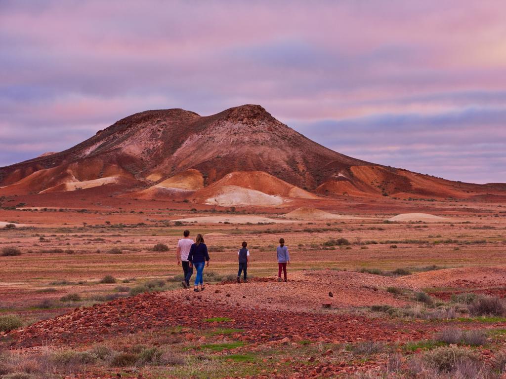 <h2>21. Coober Pedy</h2><p>About nine hours northwest of Adelaide, lies the desert-climate opal capital of the world, <a href="http://www.cooberpedy.com/" target="_blank" rel="noopener">Coober Pedy</a>. The town is remarkable because of its underground residences, called dugouts, which were built to escape the extreme daytime heat. Tick sleeping below ground off your bucket list, with a range of heritage-listed dugouts available for all budgets.</p><p><strong>See also:</strong><br><a href="https://www.escape.com.au/destinations/australia/south-australia/11-things-in-sa-that-beat-the-world/image-gallery/c418405aaf7b932fb7e3a94791fac55b">11 best things to see and do in SA</a><br><a href="https://www.escape.com.au/destinations/australia/south-australia/10-best-beaches-in-south-australia-and-what-to-eat-there/news-story/b64c1b5c845474e34735c9d025bf4852">10 best beaches in South Australia</a></p>