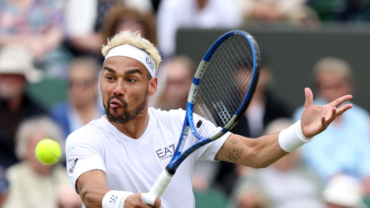 Fabio Fognini of Italy plays a backhand against Casper Ruud of Norway. (Photo by Clive Brunskill/Getty Images)