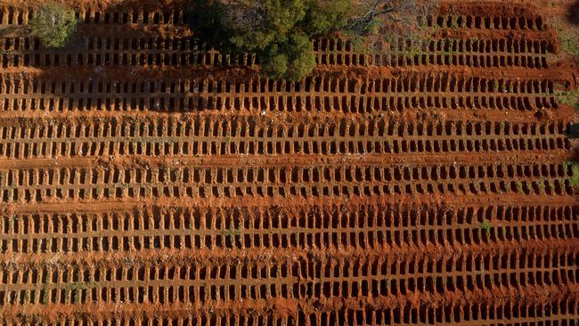 Graves on the outskirts of Sao Paulo in Brazil where authorities are struggling to cope with bodies. Picture: Fernando Marron / AFP