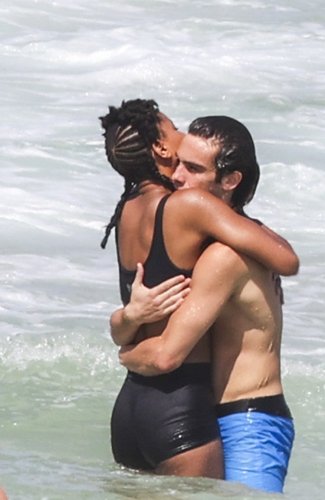 Willow Smith and Sydney-born singer-songwriter Eddie Benjamin embracing in the surf. Photo: Media Mode.