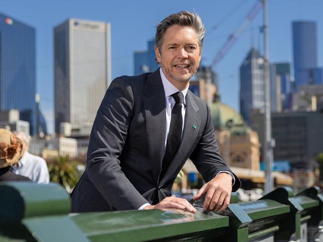 Melbourne Lord Mayor Nick Reece for 100 days in office story standing on the Princes Bridge in the CBD overlooking the Yarra River and the East of the City. Picture: Jason Edwards