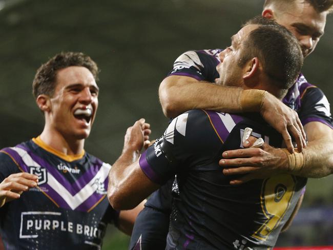 MELBOURNE, AUSTRALIA - SEPTEMBER 06: Storm players celebrate during the round 25 NRL match between the Melbourne Storm and the North Queensland Cowboys at AAMI Park on September 06, 2019 in Melbourne, Australia. (Photo by Daniel Pockett/Getty Images)