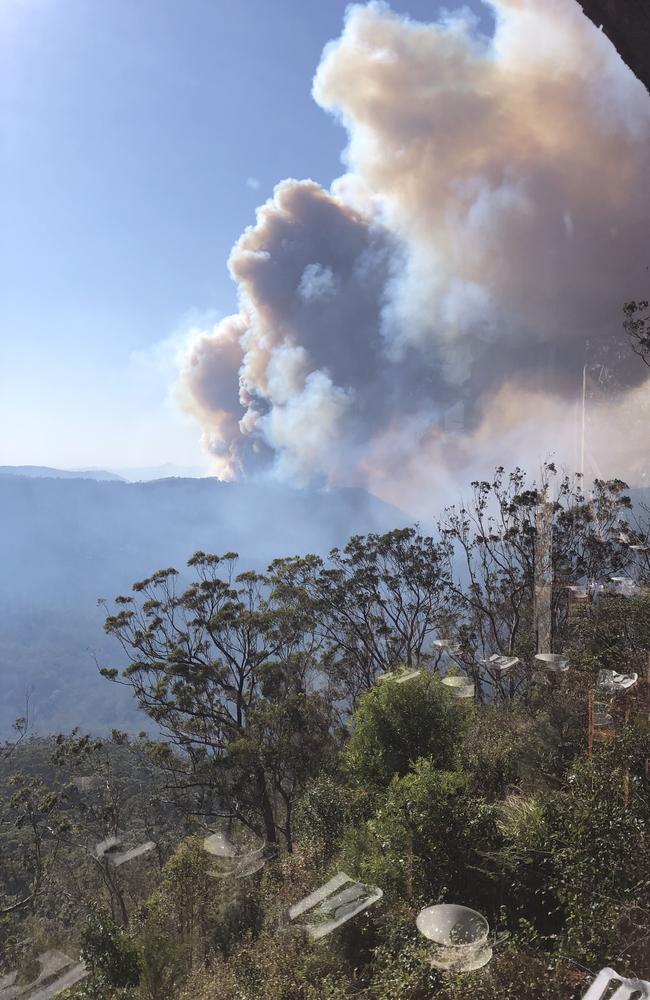 The fires as seen from the dining room of Binna Burra Lodge before evacuation. Picture: Luke Beyer