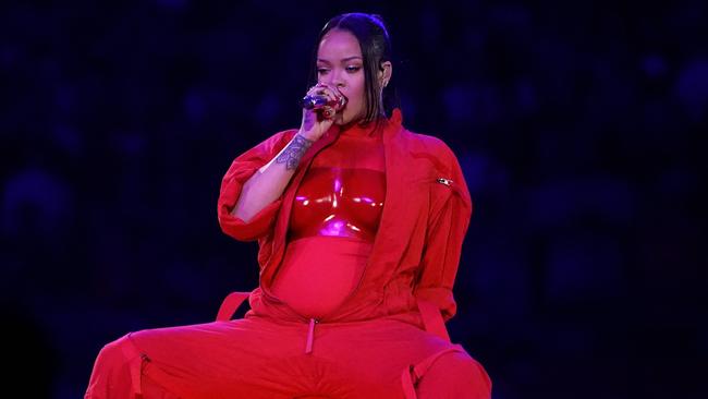 TOPSHOT - Barbadian singer Rihanna performs during the halftime show of Super Bowl LVII between the Kansas City Chiefs and the Philadelphia Eagles at State Farm Stadium in Glendale, Arizona, on February 12, 2023. (Photo by TIMOTHY A. CLARY / AFP)