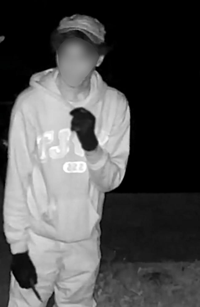 A youth caught on CCTV, appearing to be holding a knife. Residents say he has broken into their homes on multiple occasions. Picture: Supplied