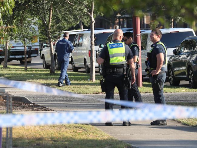 Police at the scene where the body was found in Wyndham Vale. Picture: David Crosling