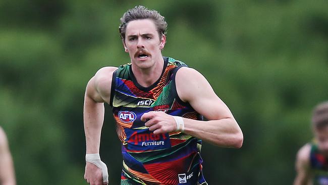 Joe Daniher will return to Essendon for pre-season after an aborted move to Sydney.