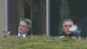 Joe Hockey and Mathias Cormann pictured smoking cigars before delivering the first Abbott Budget in 2014.