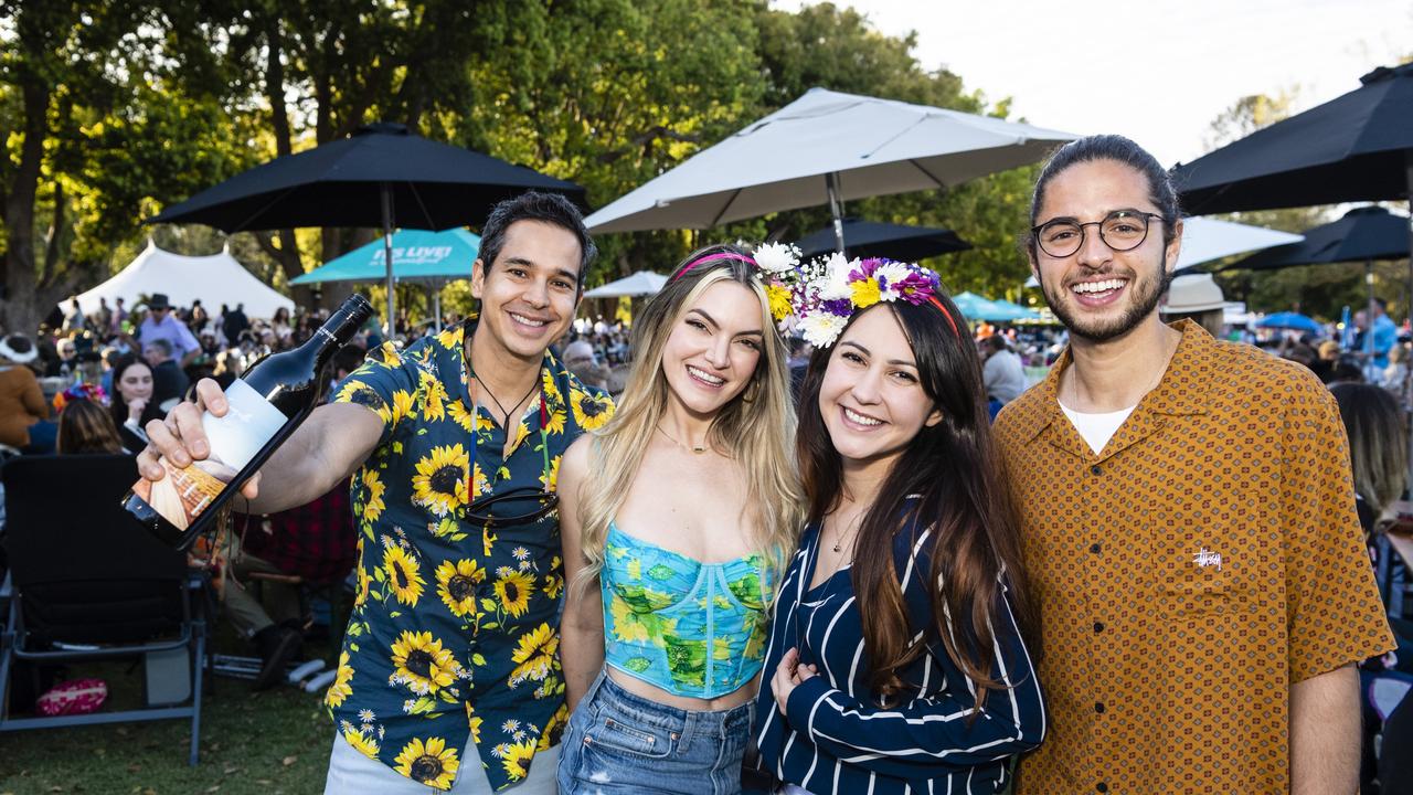 At the Festival of Food and Wine are (from left) Juan Serrano, Emmy Gomez, Tainara Eugenio and Gustavo Reis, Carnival of Flowers 2022, Saturday, September 10, 2022. Picture: Kevin Farmer