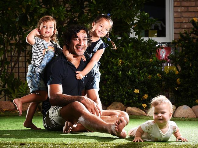 North Queensland Cowboys legend Johnathan Thurston at home with daughters Lillie, 10 months, Frankie, 4, and Charlie, 2. Picture: Zak Simmonds