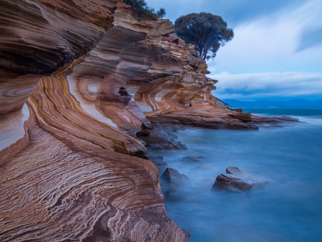 <span>47/50</span><h2>Maria Island, TAS</h2><p>Famed for its sandstone Painted Cliffs, Fossil Cliffs studded with ancient creatures and the resident Tasmanian Devils and wombats, the <a href="https://www.escape.com.au/destinations/australia/tasmania/welcome-to-wombat-central-maria-island/news-story/8363067d2dfdea5be1e82327a68372a1" target="_blank" rel="noopener">Maria Island wildlife sanctuary</a> is a must-see for Tassie lovers.</p>