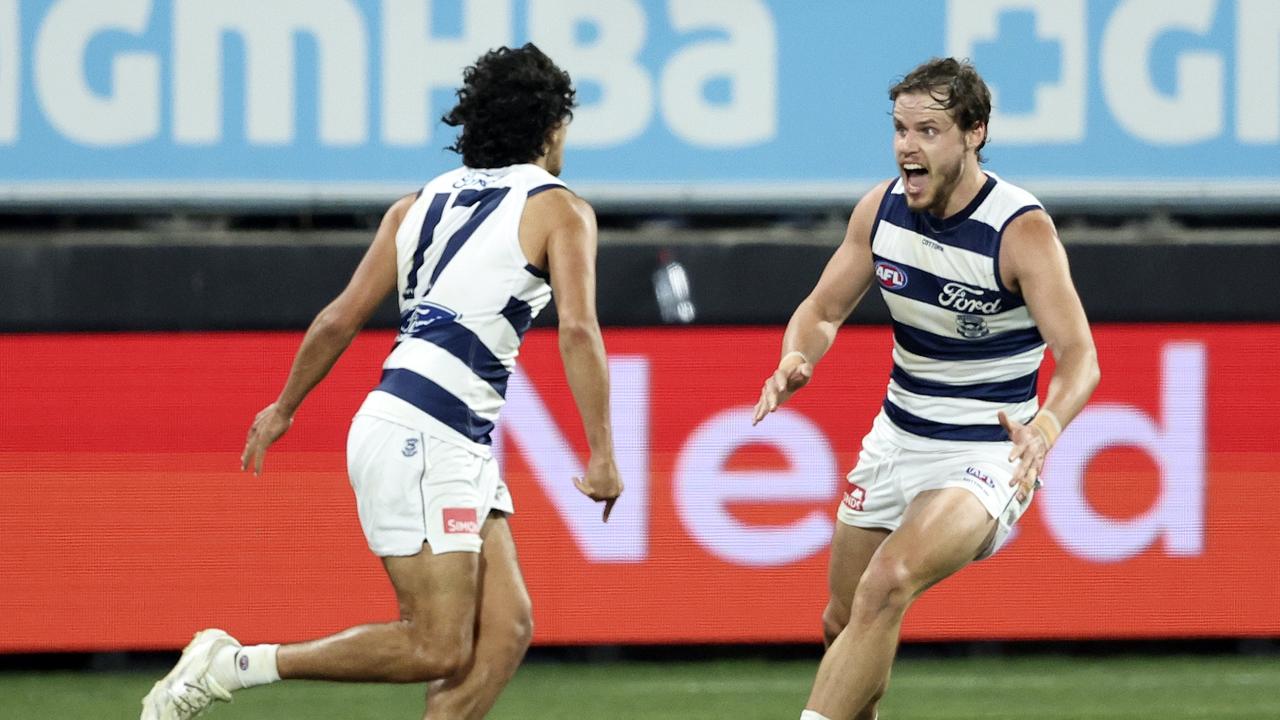 Lawson Humphries and Jake Kolodjashnij celebrate his go-ahead goal. Picture: Martin Keep/AFL Photos/via Getty Images