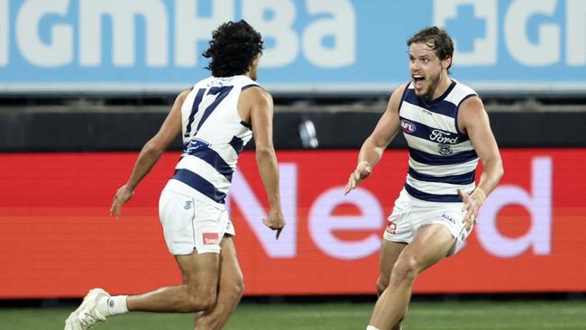 Lawson Humphries and Jake Kolodjashnij celebrate his go-ahead goal. Picture: Martin Keep/AFL Photos/via Getty Images