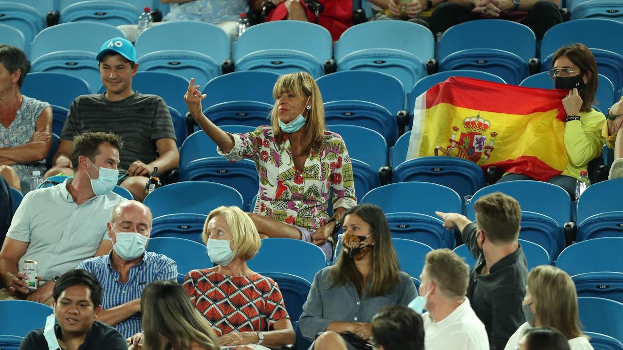 A spectator gestures during the men's singles match between Spain's Rafael Nadal and Michael Mmoh (Photo by Brandon MALONE / AFP)