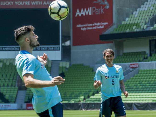 Socceroos stars Mathew Leckie (left) and Mark Milligan train in Melbourne.