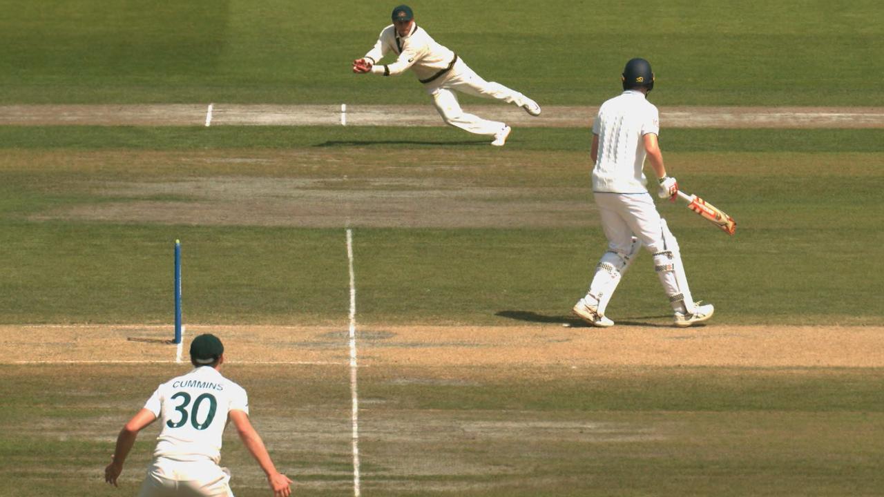 Usman Khawaja catches Moeen Ali.