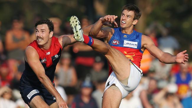 Jarryd Lyons boots his fourth goal against the Demons on Saturday.