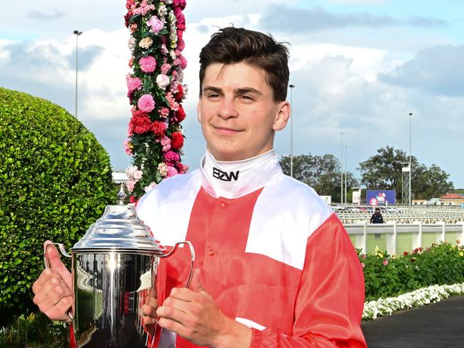 Apprentice jockey Bailey Wheeler scores the biggest win of his career, winning the Queenland Cup aboard Fancy Man. Picture: Grant Peters, Trackside Photography