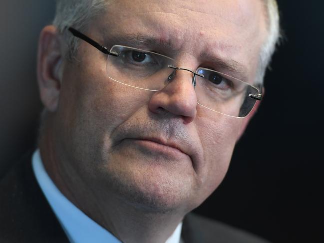 Federal Treasurer Scott Morrison speaks to the media in Melbourne, Thursday, April 5, 2018. The Treasurer was meeting with his state counterparts regarding the GST distribution. (AAP Image/Julian Smith) NO ARCHIVING