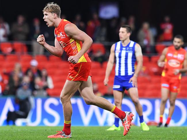 Tom Lynch broke out of his form slump, booting five goals for the Suns. Picture: AAP