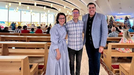 Milton Dick MP and Charis Mullen MP celebrating a farewell New Year Mass with Father Mauro Conte of Our Lady of the Southern Cross Parish, Springfield Lakes. Picture: Facebook/Milton Dick MP