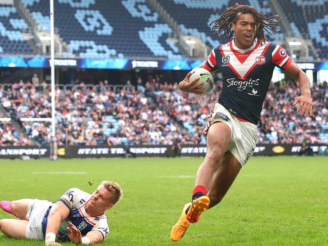 Dominic Young on his way to scoring for the Roosters. Picture: Getty Images