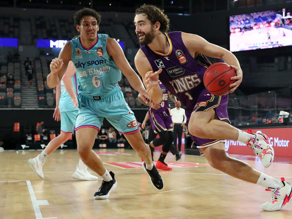 Hunter dribbles under pressure from New Zealand Breakers’ Kyrin Galloway in February, 2021. Picture: Kelly Defina/Getty Images.