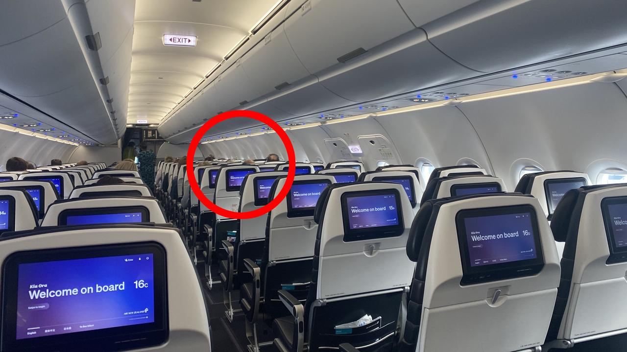 Despite heading into the weekend, the flight from New Zealand to Australia had very few passengers. The upside is that everyone had a row to themselves. Picture: Vanessa Brown/news.com.au