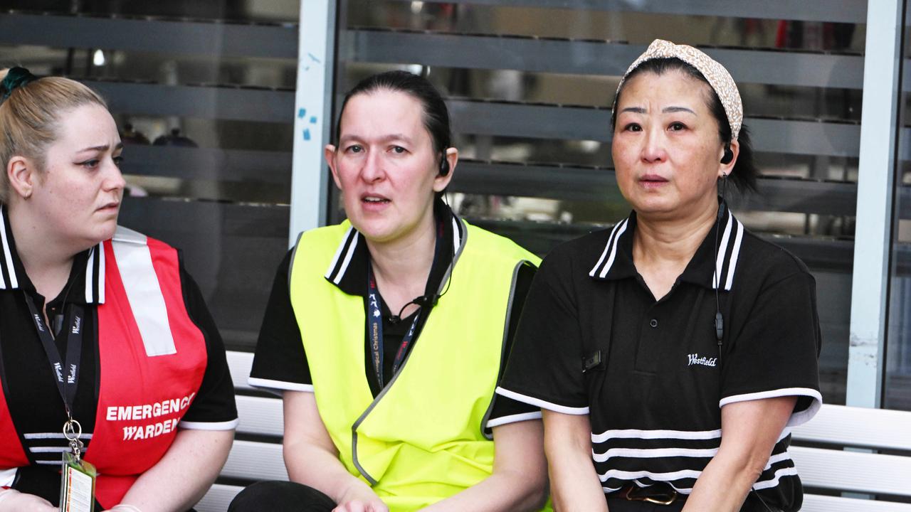 Retail workers wait outside the Westfield Marion Shopping Centre on Sunday. Picture: NewsWire / Brenton Edwards